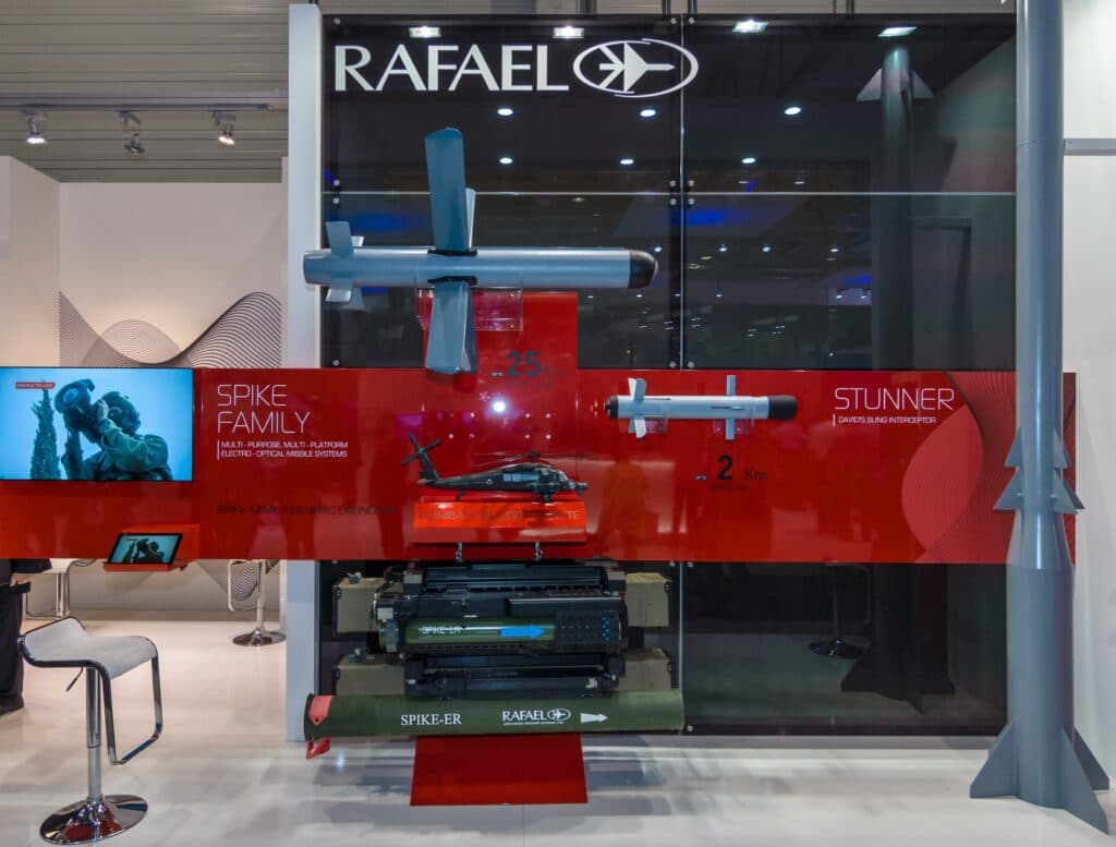 Rafael defense systems displayed at an exhibition booth.
