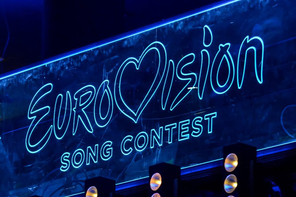 A blue neon Eurovision Song Contest sign.