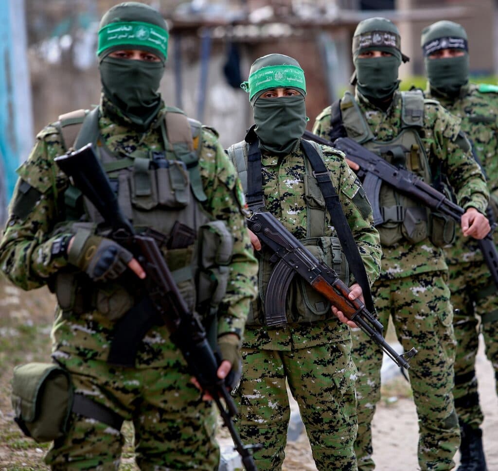 Masked Hamas militants carrying rifles during a patrol in Gaza