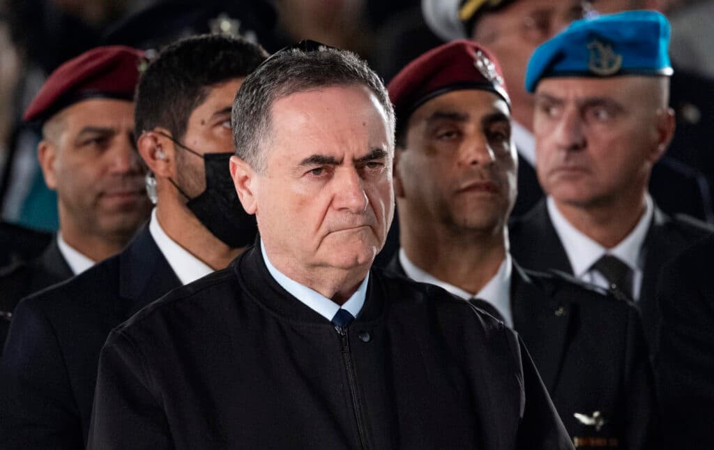 Defense Minister Israel Katz stands among Israeli security officials.