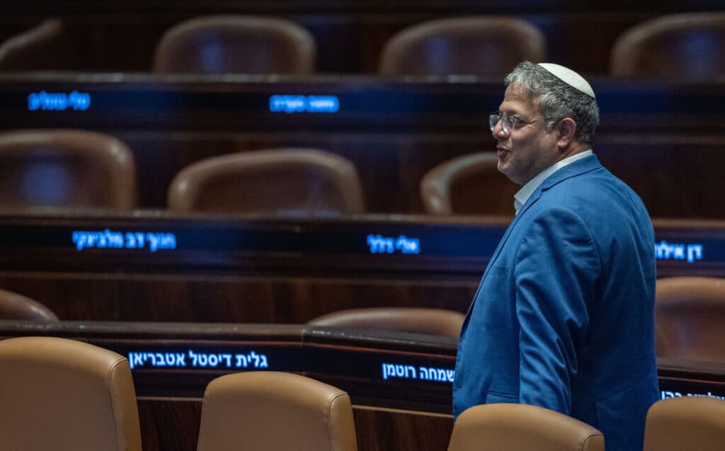 National Security Minister Itamar Ben Gvir walks through the Knesset plenum in Jerusalem.