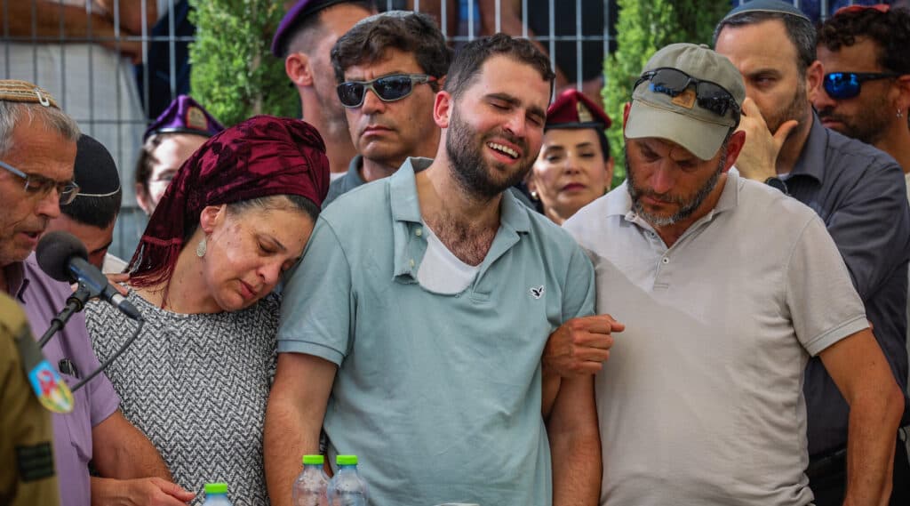 Family and friends mourn at the funeral of IDF soldier Ohad Yaari.