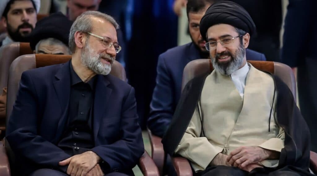 Mojtaba Khamenei and Ali Larijani seated together at an official event