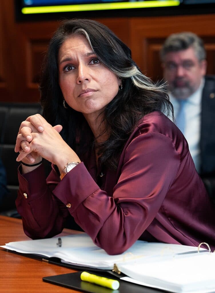 Tulsi Gabbard seated in the White House Situation Room during a meeting.