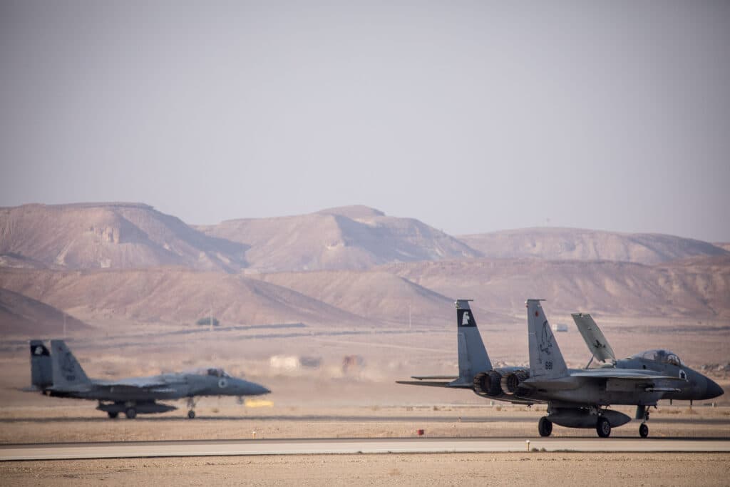Israeli Air Force fighter jets on a runway in the Negev desert.