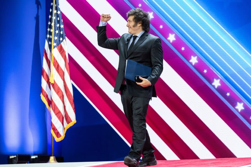 Argentine President Javier Milei arrives on stage at CPAC 2024 in the United States.