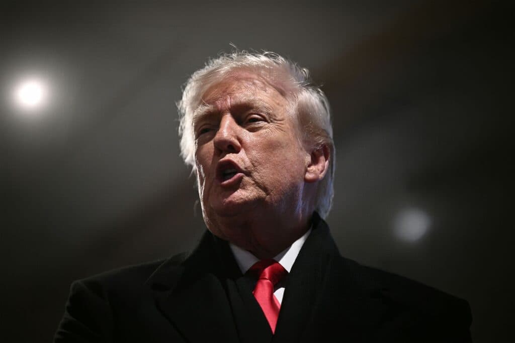 President Donald Trump speaks during a public appearance.