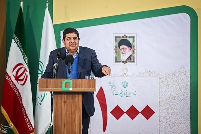 Mohammad Mokhber speaks at a podium during an event in Iran in 2019.